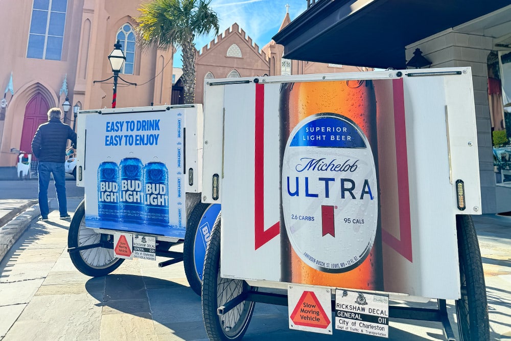 Charleston Pedicab bikes with Bud Light and Mich Ultra ads on the back panel